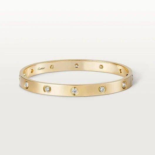Yellow-tone polished screw-motif bracelet