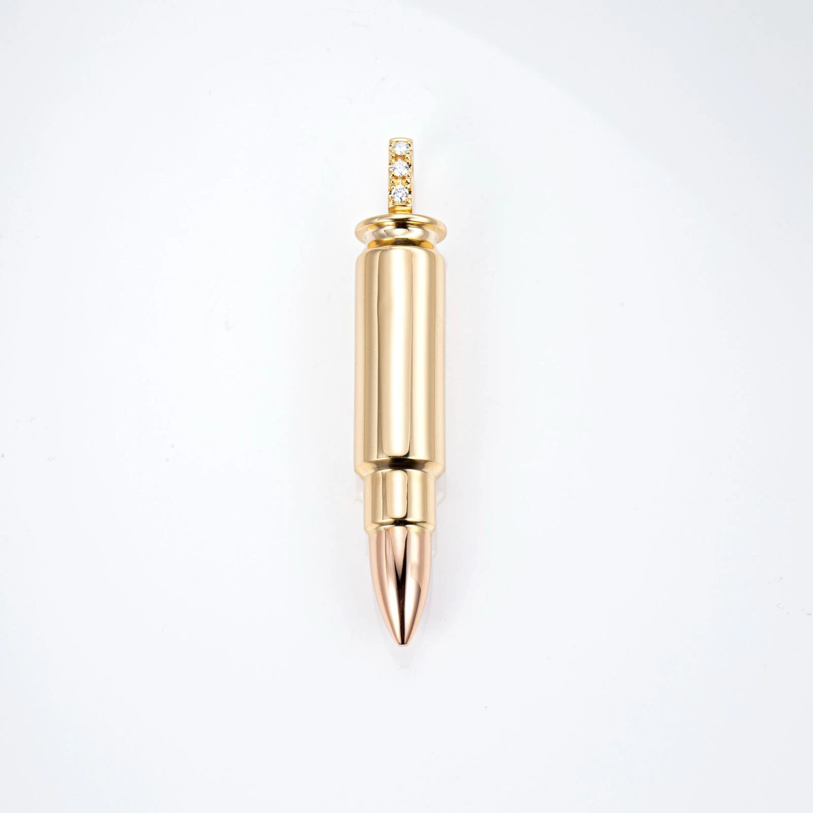A polished, elongated bullet-shaped pendant